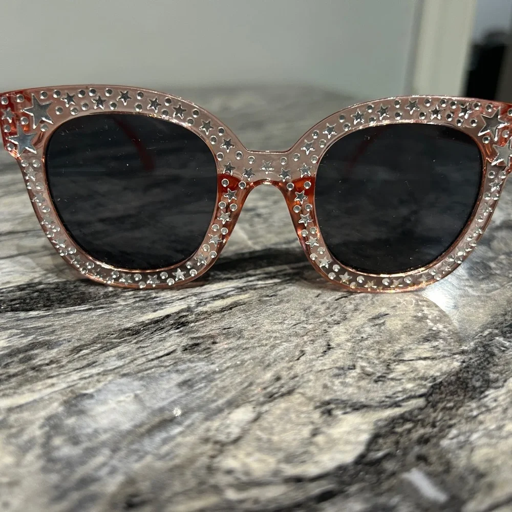 Stylish Pink Sunglasses with Star Accents
